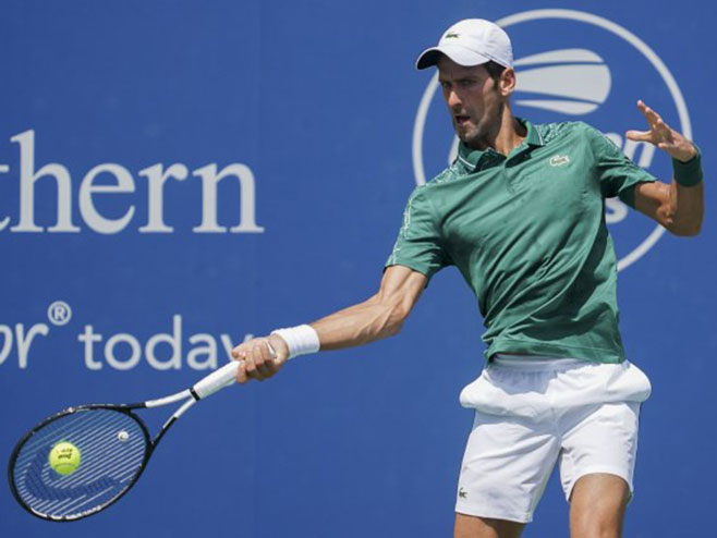 Novak Đoković (Foto: Tanjug / AP Photo/John Minchillo) - 